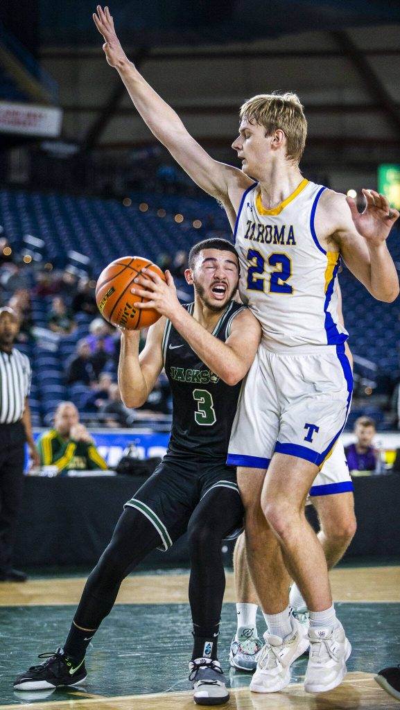 Jacksons Trey Hawkins yells while being guarded during the 4A boys state basketball game against Tahoma on Wednesday, Feb. 28, 2024 in Tacoma, Washington. (Olivia Vanni / The Herald)