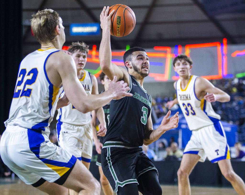Jacksons Trey Hawkins drives to the hoop during the 4A boys state basketball game against Tahoma on Wednesday, Feb. 28, 2024 in Tacoma, Washington. (Olivia Vanni / The Herald)