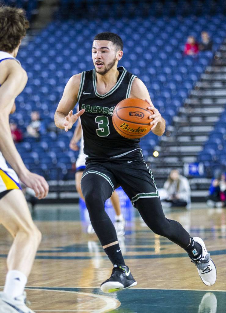 Jacksons Trey Hawkins takes the ball down the court during the 4A boys state basketball game against Tahoma on Wednesday, Feb. 28, 2024 in Tacoma, Washington. (Olivia Vanni / The Herald)