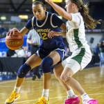 Everetts Alana Washington maneuvers around an Auburn player during the 3A girls state basketball game on Wednesday, Feb. 28, 2024 in Tacoma, Washington. (Olivia Vanni / The Herald)