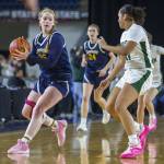 Everetts Emily Barton looks for an open teammate to pass to during the 3A girls state basketball game against Auburn on Wednesday, Feb. 28, 2024 in Tacoma, Washington. (Olivia Vanni / The Herald)