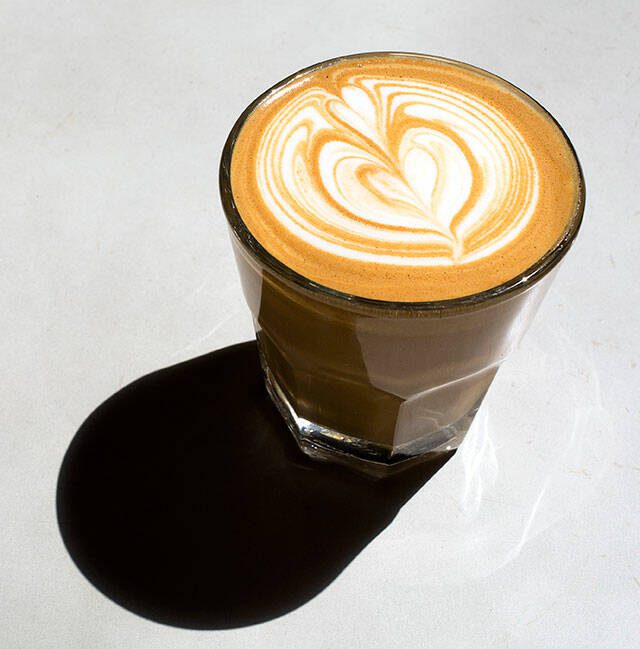 Narrative Coffee owner and head barista Maxwell Mooney at his business on Tuesday, June 27, 2017 in Everett, Wa. Mooney says one latte in Kirkland stirred his interest in coffee. (Andy Bronson / The Herald)