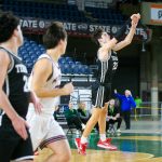 Mountlake Terraces Brody Myers-Little hits a buzzer-beater from well beyond half court during a WIAA 3A Boys Basketball quarterfinal against Mount Spokane on Thursday, Feb. 29, 2024, at the Tacoma Dome in Tacoma, Washington. (Ryan Berry / The Herald)