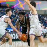 Mountlake Terrace junior Rayshaun Connor tries to split the defense during a WIAA 3A Boys Basketball quarterfinal against Mount Spokane on Thursday, Feb. 29, 2024, at the Tacoma Dome in Tacoma, Washington. (Ryan Berry / The Herald)