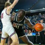Mountlake Terrace senior Zaveon Jones tries to muscle his way to the rim during a WIAA 3A Boys Basketball quarterfinal against Mount Spokane on Thursday, Feb. 29, 2024, at the Tacoma Dome in Tacoma, Washington. (Ryan Berry / The Herald)