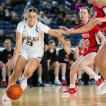 Arlington junior Jersey Walker goes to the baseline with the ball during a WIAA 3A Girls Basketball quarterfinal against Snohomish on Thursday, Feb. 29, 2024, at the Tacoma Dome in Tacoma, Washington. (Ryan Berry / The Herald)
