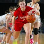 Snohomish sophomore Kendall Hammer gets fouled while driving to the paint during a WIAA 3A Girls Basketball quarterfinal against Arlington on Thursday, Feb. 29, 2024, at the Tacoma Dome in Tacoma, Washington. (Ryan Berry / The Herald)