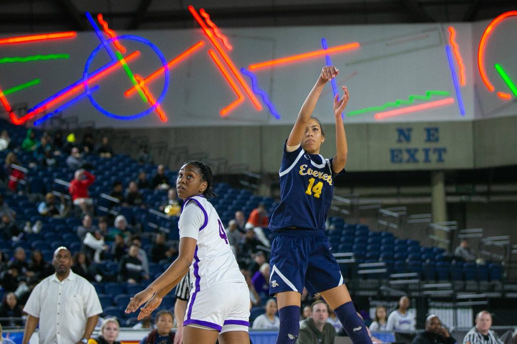 Everett senior Mae Washington puts up a three from deep during a WIAA 3A Girls Basketball quarterfinal against Garfield on Thursday, Feb. 29, 2024, at the Tacoma Dome in Tacoma, Washington. (Ryan Berry / The Herald)