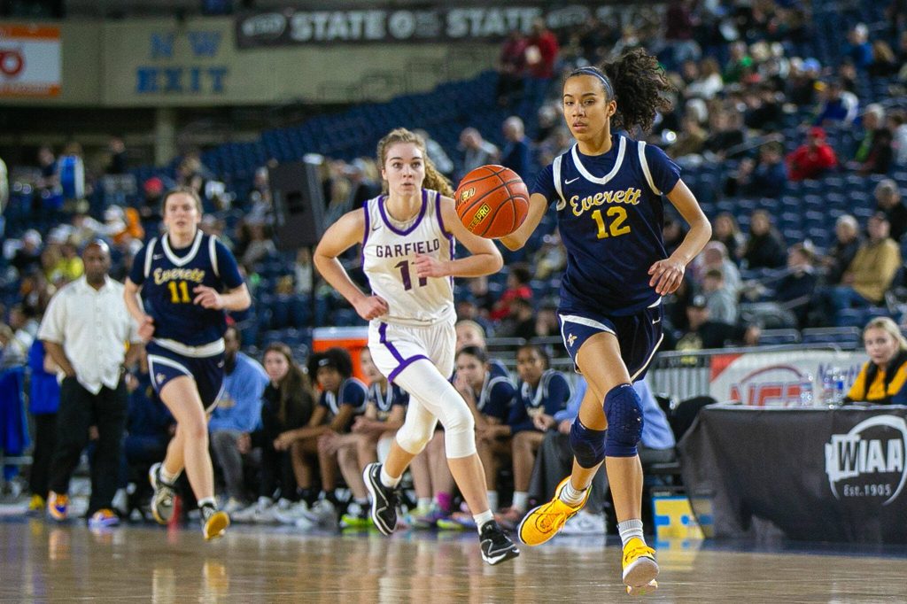 Everett senior Alana Washington takes a steal the other way for a pull-up three during a WIAA 3A Girls Basketball quarterfinal against Garfield on Thursday, Feb. 29, 2024, at the Tacoma Dome in Tacoma, Washington. (Ryan Berry / The Herald)