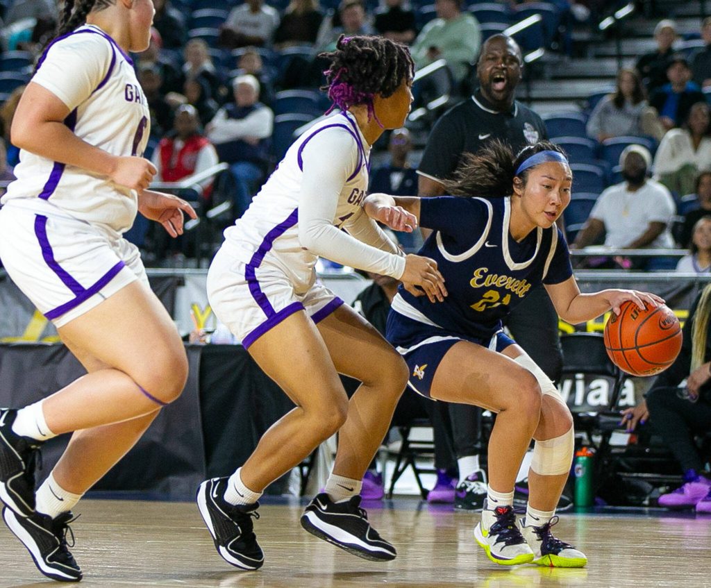 Everett senior Bella Nguon dries to get to the paint during a WIAA 3A Girls Basketball quarterfinal against Garfield on Thursday, Feb. 29, 2024, at the Tacoma Dome in Tacoma, Washington. (Ryan Berry / The Herald)