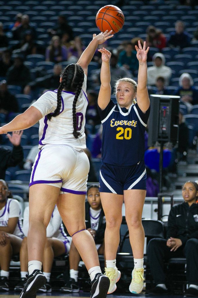 Everett freshman Haylie Oyler shoots a three during a WIAA 3A Girls Basketball quarterfinal against Garfield on Thursday, Feb. 29, 2024, at the Tacoma Dome in Tacoma, Washington. (Ryan Berry / The Herald)