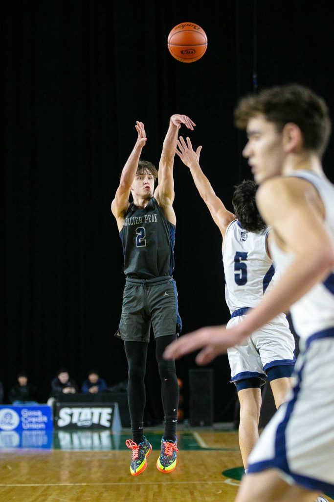 Glacier Peaks Jo Lee sinks a three pointer during a WIAA 4A Boys Basketball quarterfinal against Gonzaga Prep on Thursday, Feb. 29, 2024, at the Tacoma Dome in Tacoma, Washington. (Ryan Berry / The Herald)