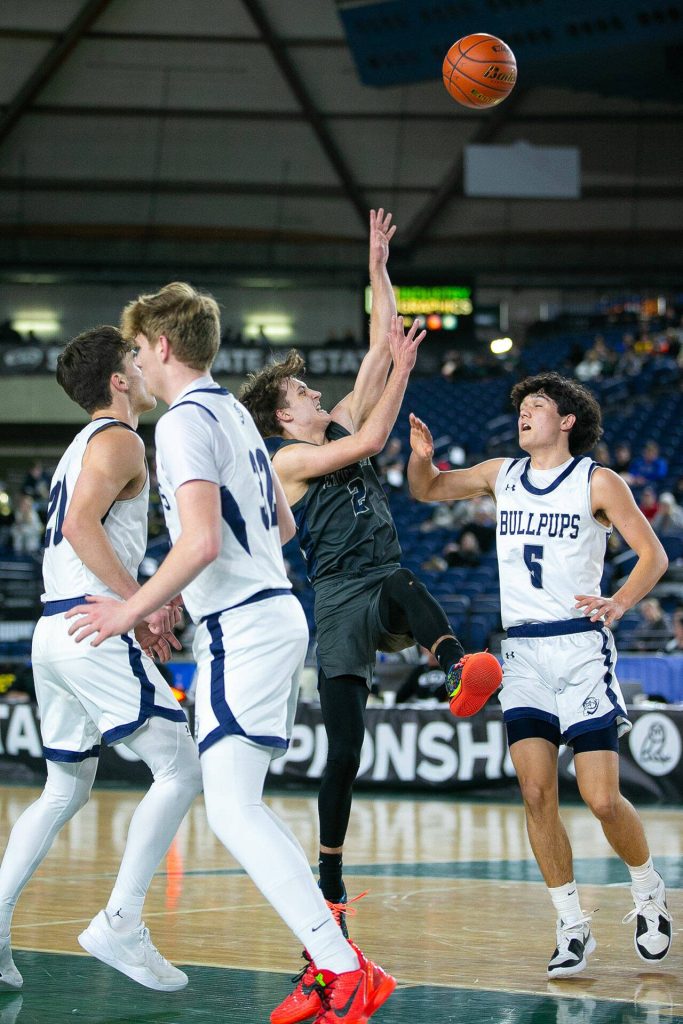 Glacier Peaks Jo Lee takes an off-balance shot during a WIAA 4A Boys Basketball quarterfinal against Gonzaga Prep on Thursday, Feb. 29, 2024, at the Tacoma Dome in Tacoma, Washington. (Ryan Berry / The Herald)