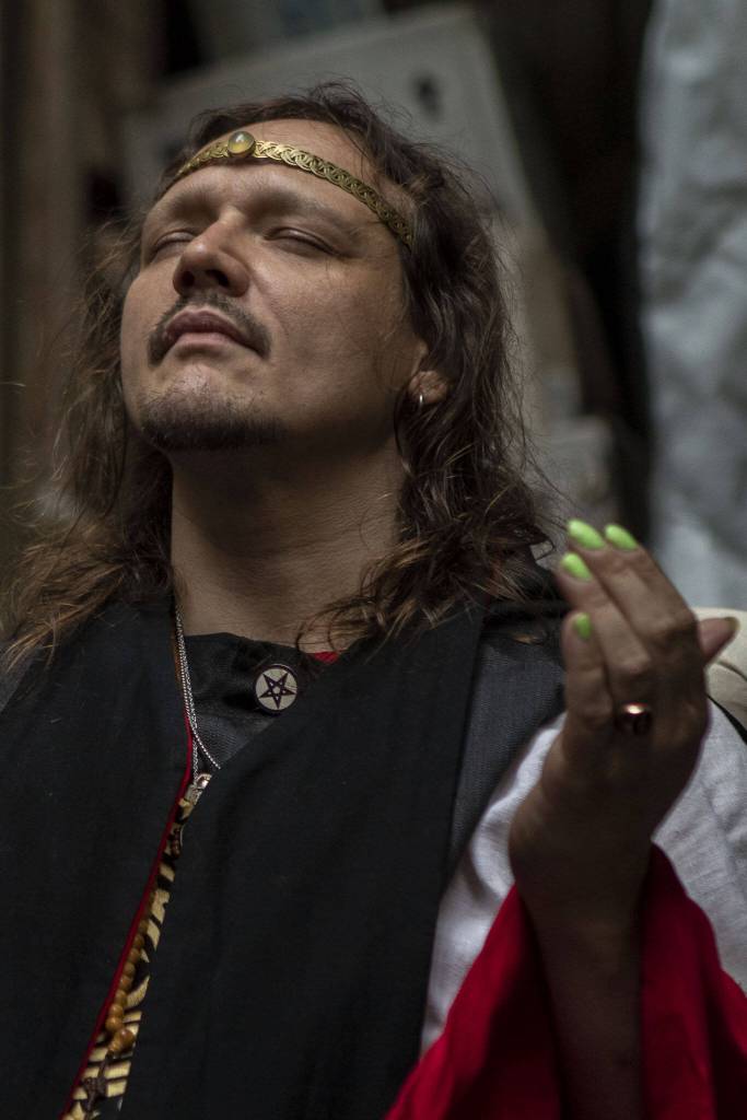 Archpriest Dusty Dionne leads the Circle during the Lavender Wishes ritual for Litha, another name for the summer solstice, at the Aquarian Tabernacle Church in Index, Washington, in June 2023. Litha marks the beginning of summer. (Annie Barker / The Herald)