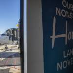 The first flight from Paine Field to Honolulu is prepared by grounds crew on Nov. 17, 2023 in Everett. (Olivia Vanni / The Herald)