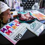 Merchandise for the band Cytrus displayed during a headlining show at Madame Lous on Friday, Dec. 29, 2023 in Seattle, Washington. (Olivia Vanni / The Herald)