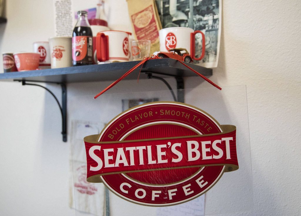 A shelf of memorabilia of Dave Stewarts coffee businesses sit on display on Tuesday, Jan. 9, 2024 in Snohomish, Washington. (Olivia Vanni / The Herald)