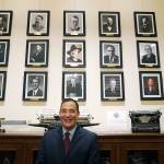 FILE - Washington Secretary of State Steve Hobbs poses in front of photos of the 15 people who previously held the office on Nov. 22, 2021, after he was sworn in at the Capitol in Olympia, Wash. Hobbs faces several challengers as he runs for election to the office he was appointed to last fall. (AP Photo/Ted S. Warren, File)