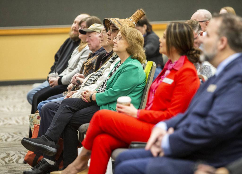 People listen to speakers at the Lynnwood State of the City event on Wednesday, March 6, 2024 in Lynnwood, Washington. (Olivia Vanni / The Herald)