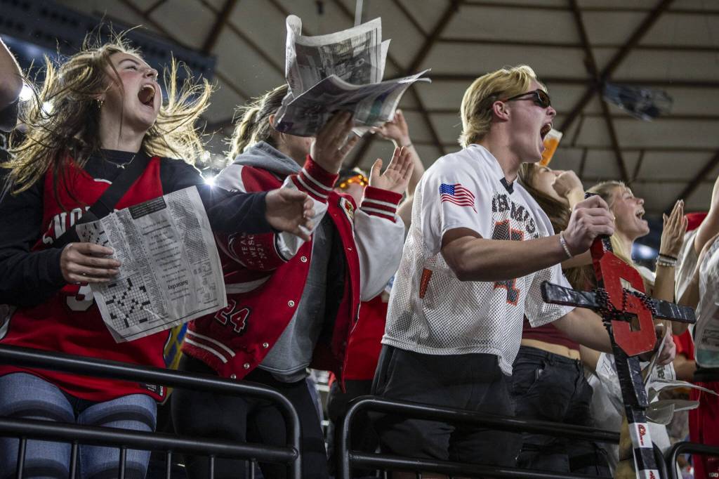 Snohomish fans cheer during a 3A semifinal game between Snohomish and Mead at the Tacoma Dome on Friday, March 1, 2024 in Tacoma, Washington. Snohomiosh fell, 56-50. (Annie Barker / The Herald)
