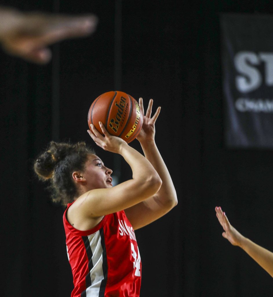 Snohomishs Tyler Gildersleeve-Stiles (34) shoots the ball during a 3A semifinal game between Snohomish and Mead at the Tacoma Dome on Friday, March 1, 2024 in Tacoma, Washington. Snohomiosh fell, 56-50. (Annie Barker / The Herald)
