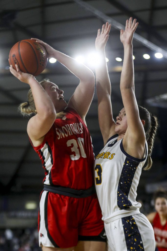 Snohomishs Catherine Greene (30) shoots the ball during a 3A semifinal game between Snohomish and Mead at the Tacoma Dome on Friday, March 1, 2024 in Tacoma, Washington. Snohomiosh fell, 56-50. (Annie Barker / The Herald)