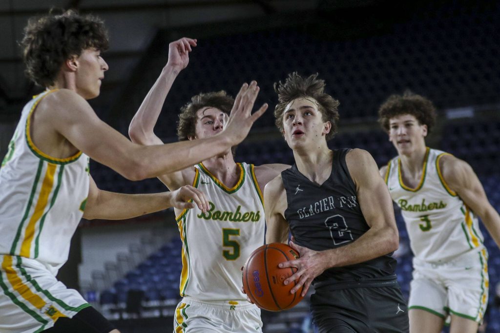 Glacier Peaks Jo Lee (2) shoots the ball during a 4A semifinal game between Glacier Peak and Richland at the Tacoma Dome on Friday, March 1, 2024 in Tacoma, Washington. Glacier Peak fell, 70-59. (Annie Barker / The Herald)