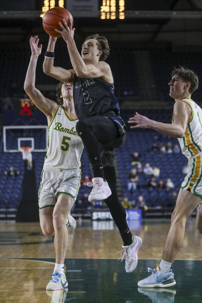 Glacier Peaks Jo Lee (2) shoots the ball during a 4A semifinal game between Glacier Peak and Richland at the Tacoma Dome on Friday, March 1, 2024 in Tacoma, Washington. Glacier Peak fell, 70-59. (Annie Barker / The Herald)