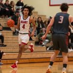 Skagit Valley College freshman Sylas Williams, a Jackson High School graduate, takes the ball up the court during a game at Skagit Valley College. Williams is the leading rebounder in the Northwest Athletic Confrence. (Photo courtesy of Skagit Valley College)
