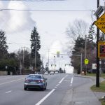 A car drives past a speed sign along Casino Road alerting drivers they will be crossing into a school zone next to Horizon Elementary on Thursday, March 7, 2024 in Everett, Washington. (Olivia Vanni / The Herald)