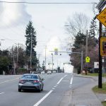A car drives past a speed sign along Casino Road alerting drivers they will be crossing into a school zone next to Horizon Elementary on Thursday, March 7, 2024 in Everett, Washington. (Olivia Vanni / The Herald)