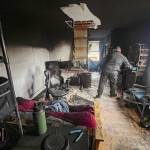 Firefighters respond to a report of a smoke alarm going off in the 100 block of West Main Street in Monroe on Monday morning. Fire officials confirmed the fire was coming from living quarters above Good Brewing Co. (Provided by Snohomish County Regional Fire and Rescue).