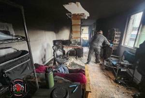 Firefighters respond to a report of a smoke alarm going off in the 100 block of West Main Street in Monroe on Monday morning. Fire officials confirmed the fire was coming from living quarters above Good Brewing Co. (Provided by Snohomish County Regional Fire and Rescue).