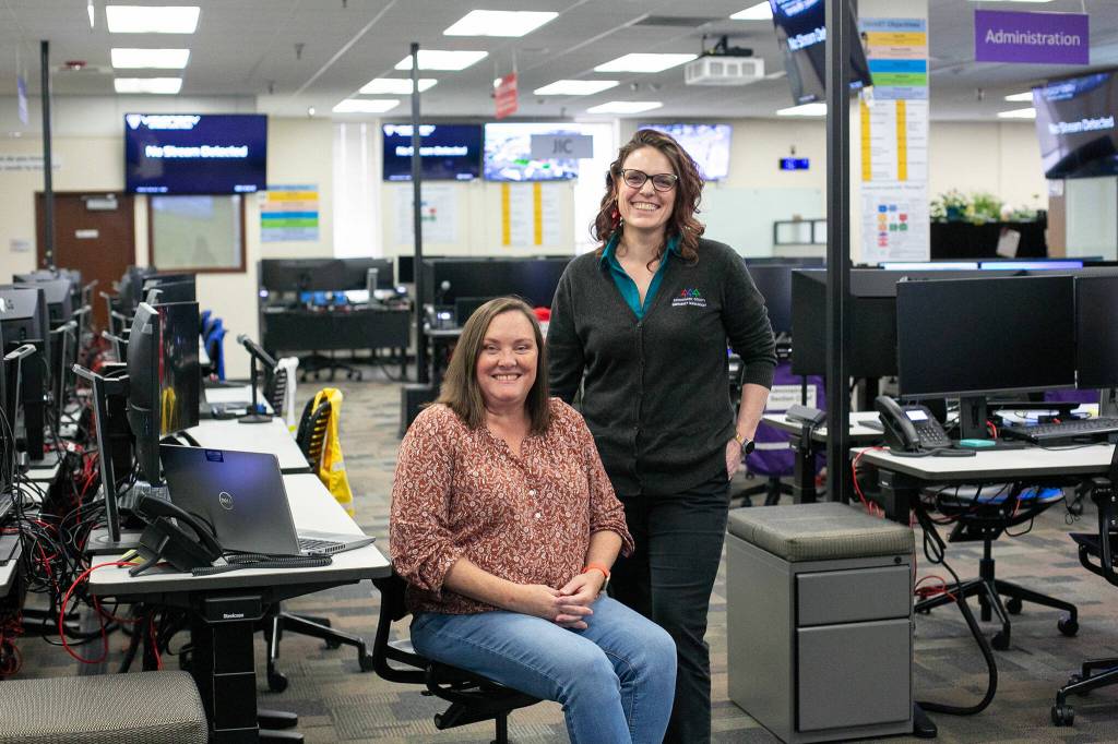 Director Lucia Schmit, right, and Deputy Director Dara Salmon inside the Snohomish County Department of Emergency Services on Friday, March 8, 2024, in Everett, Washington. (Ryan Berry / The Herald)