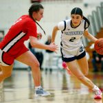 Meadowdales Gia Powell tries to get past a defender against Snohomish during the a district semifinal game Feb. 14 at Marysville Pilchuck High School in Marysville. (Ryan Berry / The Herald)