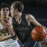 Glacier Peaks Jo Lee moves with the ball during a Class 4A state semifinal game against Richland on March 1 at the Tacoma Dome in Tacoma. (Annie Barker / The Herald)
