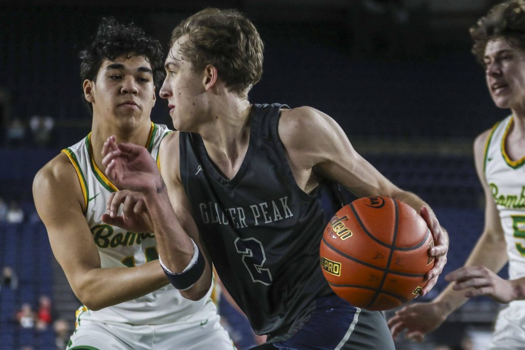 Glacier Peaks Jo Lee moves with the ball during a Class 4A state semifinal game against Richland on March 1 at the Tacoma Dome in Tacoma. (Annie Barker / The Herald)