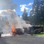 Firefighters respond to a small RV and a motorhome fire on Tuesday afternoon in Marysville. (Provided by Snohomish County Fire Distrct 22)
