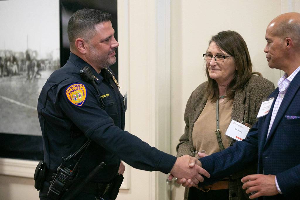 Everett Police Chief John DeRousse meets with people prior to the Everett State of the City Address on Thursday, March 21, 2024, at the Everett Mall in Everett, Washington. (Ryan Berry / The Herald)