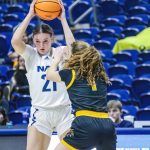 Northern Arizona Universitys Emily Rodabaugh, an Archbishop Murphy High School graduate, holds the ball high during a game in Flagstaff, Ariz. (Photo courtesy of Northern Arizona University)