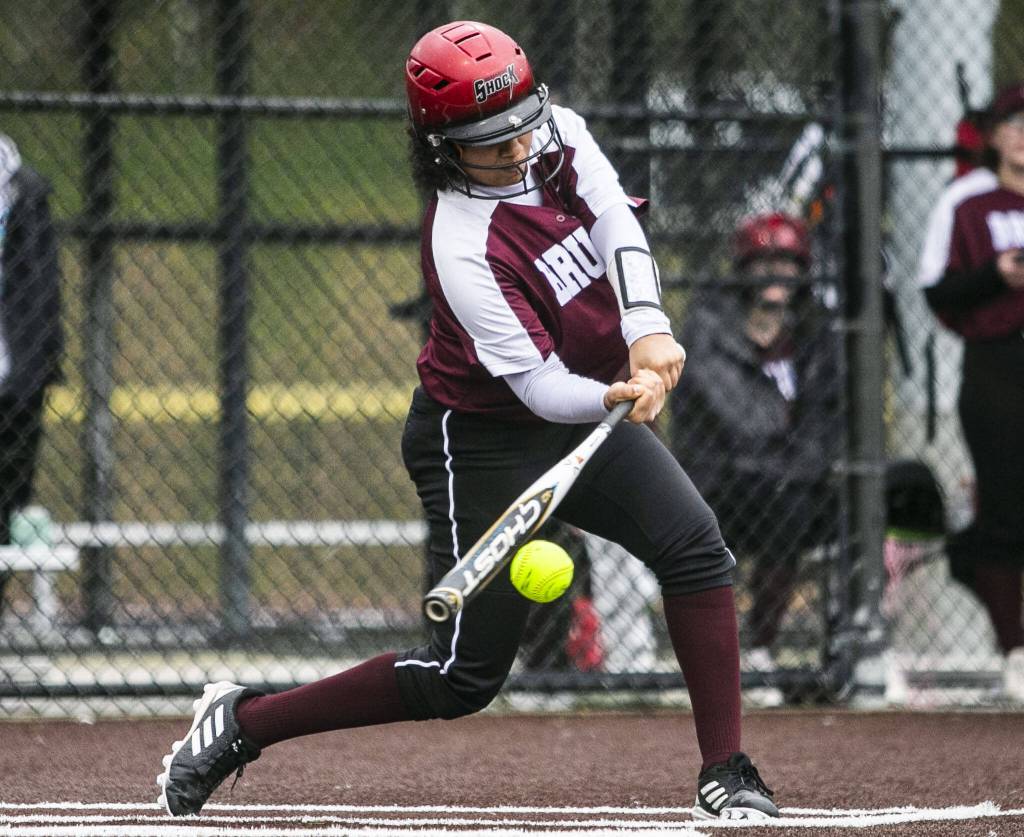 Cascades Jaidyn Wilson gets a hit during the game against Lakewood on March 13, 2023 in Everett. (Olivia Vanni / The Herald)