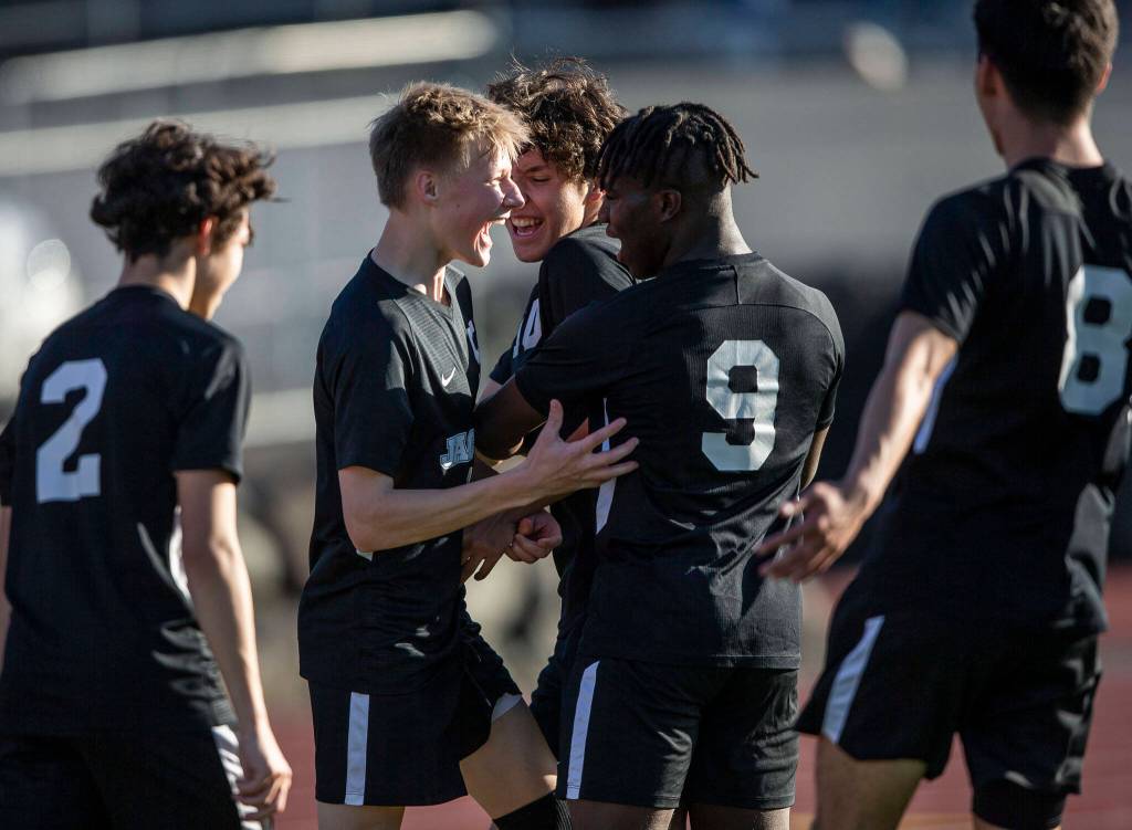 Jacksons Ian Friedrichsen (center left) celebrates his goal with his teammates during the game against Bothell on May 11, 2023 in Everett. (Olivia Vanni / The Herald)