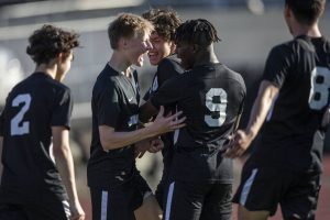 Jackson’s Ian Friedrichsen celebrates his goal with his teammates during the game against Bothell on Thursday, May 11, 2023 in Everett, Washington. (Olivia Vanni / The Herald)