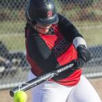 Snohomishs Rian Doyle tips the ball during the game against Glacier Peak on Friday, March 15, 2024 in Snohomish, Washington. (Olivia Vanni / The Herald)