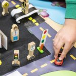 Students use a 3D model to demonstrate their groups traffic solutions at Hazelwood Elementary School on Wednesday, March 29, 2023 in Lynnwood, Washington. (Olivia Vanni / The Herald)