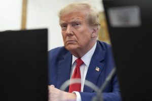 FILE - Former President Donald Trump sits in the courtroom before the start of closing arguments in his civil business fraud trial at New York Supreme Court, Jan. 11, 2024, in New York. Judge Anil Singh, a New York appellate judge, has refused to halt collection of Trump's $454 million civil fraud penalty while he appeals, rejecting the former president's request that he be allowed to post a bond covering just a fraction of what he owes.(AP Photo/Seth Wenig, Pool, File)