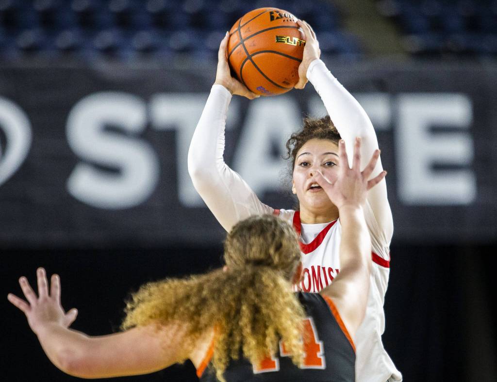 Snohomishs Tyler Gildersleeve-Stiles looks for a teammate to pass to during the 3A girls state basketball game against Kennewick on Wednesday, Feb. 28, 2024 in Tacoma. (Olivia Vanni / The Herald)