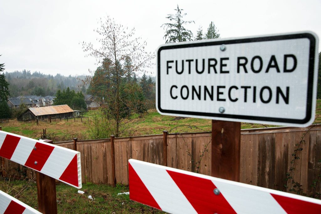 A parcel of land up for potential rezoning, seen here from the Hillside Vista luxury development, is surrounded on two sides by modern neighborhoods Monday, March 25, 2024, in Lake Stevens, Washington. (Ryan Berry / The Herald)