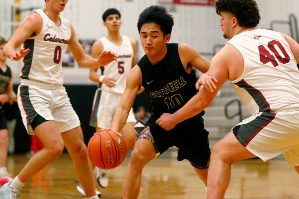 Marysville Getchell’s Bubba Palacol makes his way to the hoop against Cedarcrest on Tuesday, Jan. 16, 2024, at Cedarcrest High School in Duvall, Washington. (Ryan Berry / The Herald)