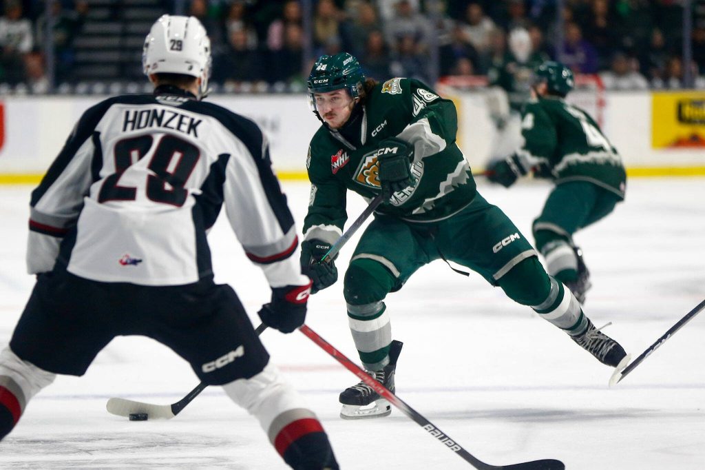 Everett Silvertips forward Caden Brown tries to get the puck to the net against the Vancouver Giants during the 2024 playoff opener on Friday, March 29, 2024, at Angel of the Winds Arena in Everrett, Washington. (Ryan Berry / The Herald)